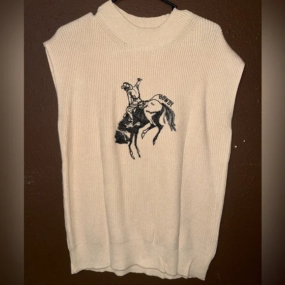 Women’s Cream Sleeveless Sweater with Cowboy Graphic - Picture 1 of 2